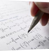 hand-doing-math-homework,1043038